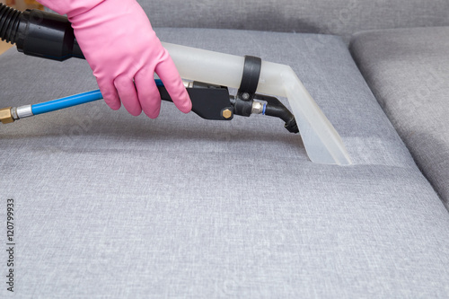Bed chemical cleaning with professionally extraction method. Upholstered furniture. Early spring cleaning or regular clean up.