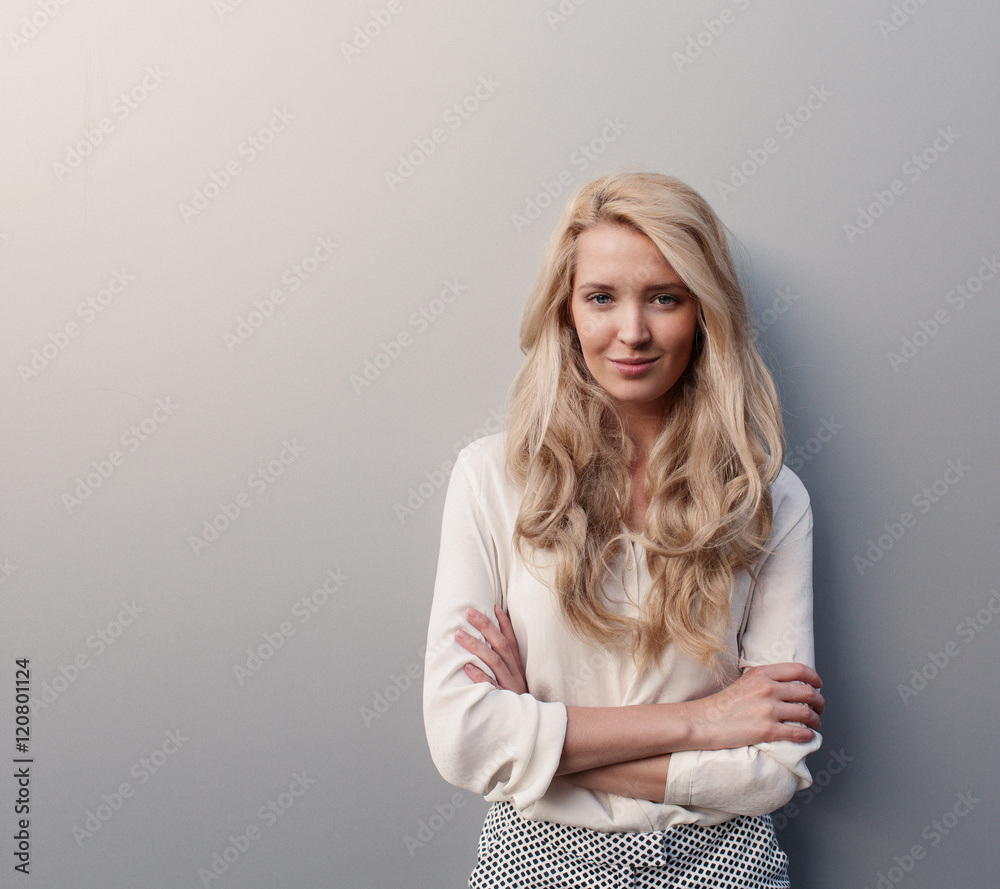 Portrait of young beautiful woman with long hair have fun and good mood looking in camera and smiling Portrait of young beautiful woman with long hair have fun and good mood looking in camera and smiling