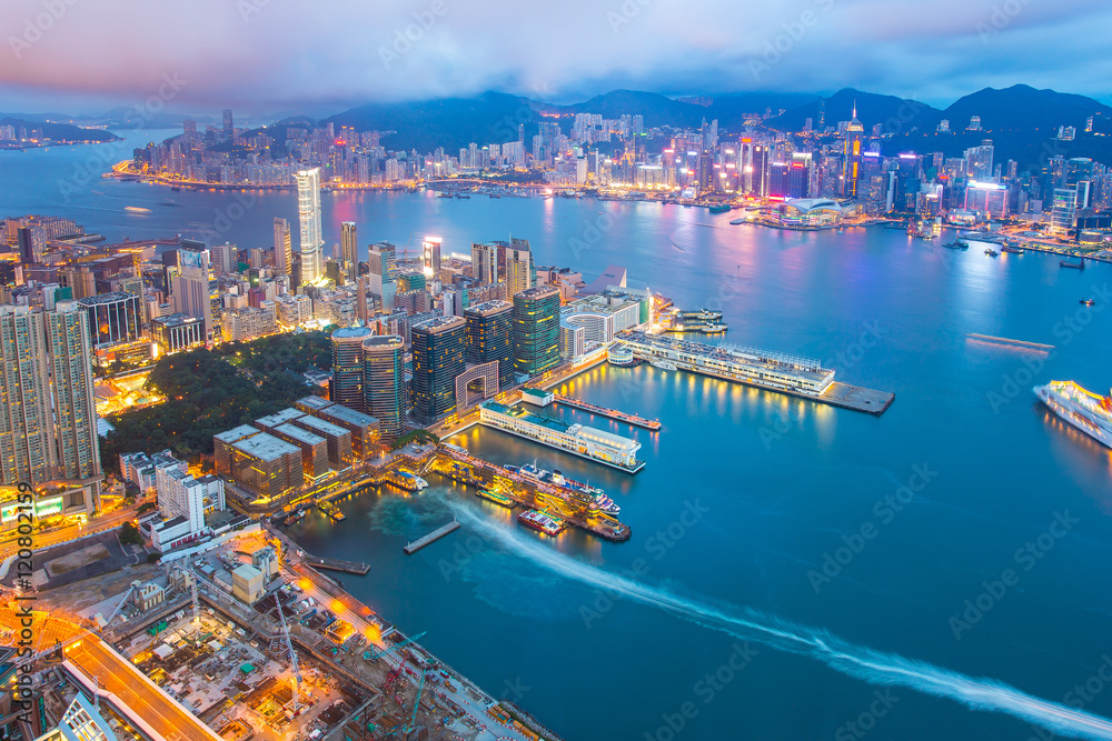 Night at the Victoria Harbor in Hong Kong city skyline