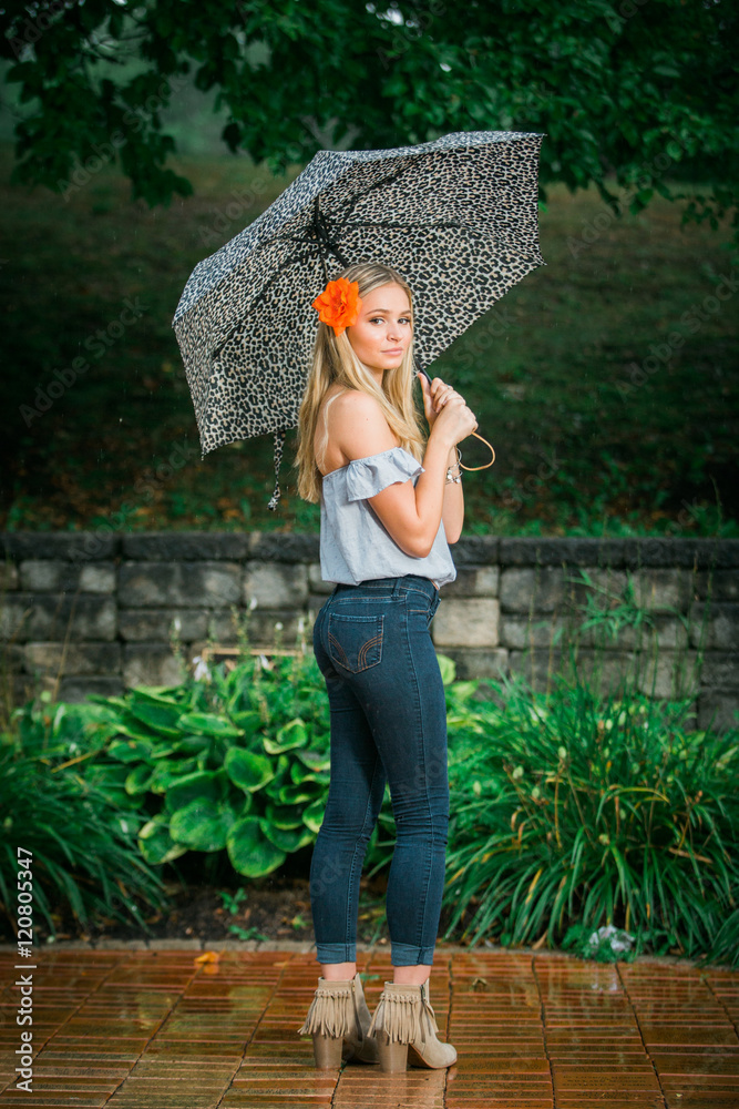 girl poses with a umbrella Stock Photo | Adobe Stock