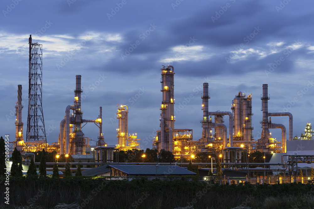 Petrochemical Oil and gas refinery at night sky