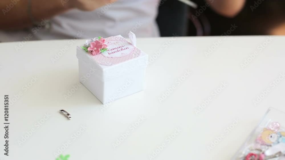 Woman makes boxes, decorations, handmade. Made by hands. Production of boxes, letters and numbers. Sewing by hand. Items for children and mothers. Woman makes boxes, decorations, handmade. Made by hands. Production of boxes, letters and numbers. Sewing by hand. Items for children and mothers.