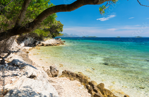 Fototapeta Naklejka Na Ścianę i Meble -  hidden beach in Dalmatia with crystal clear water, Croatia