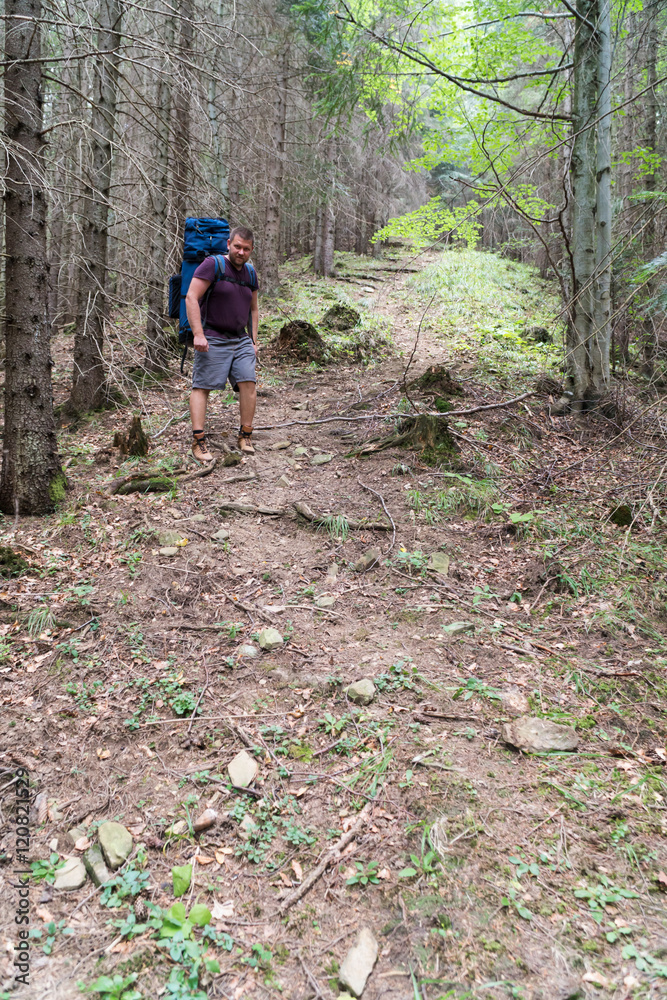 Fototapeta premium Tourist coming down