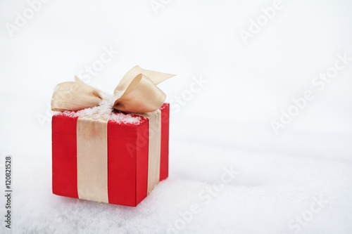 gift box in the snow outdoors