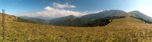 east view from Handliarka mountain with summits of Prasiva and Velka Chochula in Nizke Tatry mountains in Slovakia photo