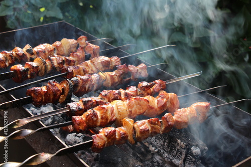 roasted meat on skewers