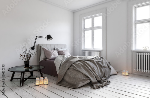 Single bed in room with radiators under windows