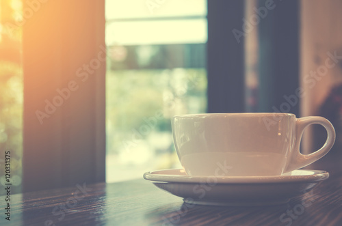 Coffee cup in coffee shop - vintage style