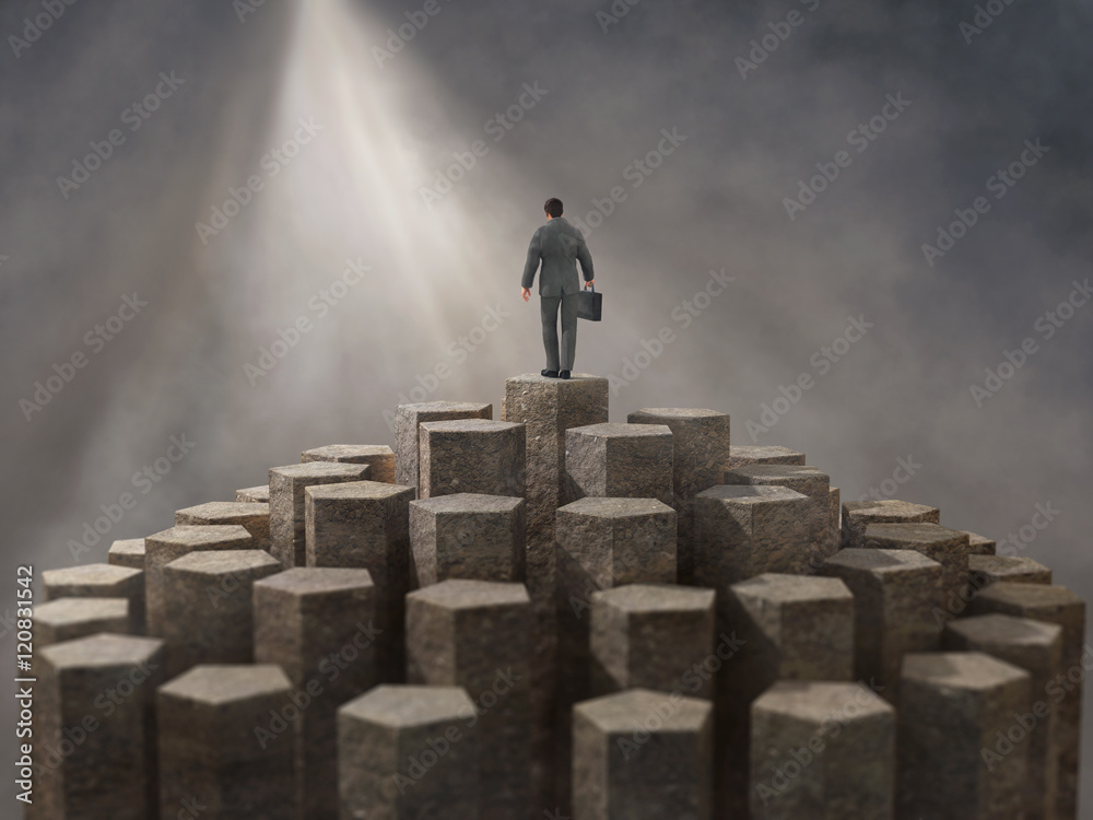 businessman standing on the top of the pyramid
businessman standing on the top of the pyramid