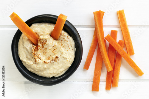 Photos Hummus with Carrot Sticks Top View