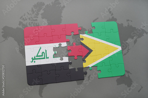 puzzle with the national flag of iraq and guyana on a world map background.