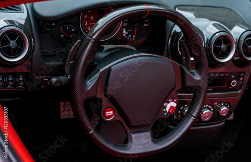 Dashboard and instrument panel  steering wheel in the sport racing car
