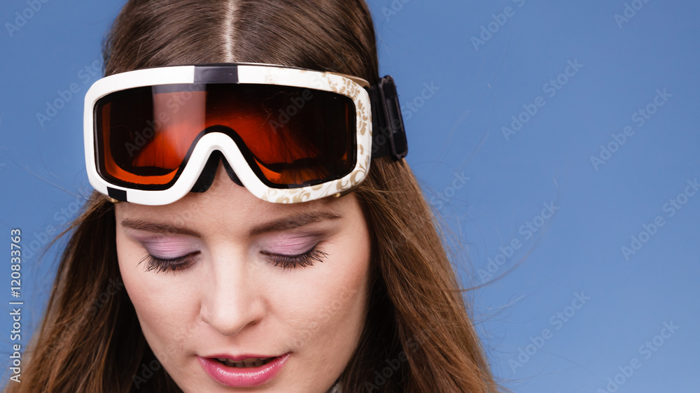 skier girl wearing warm clothes ski googles portrait. skier girl wearing warm clothes ski googles portrait.