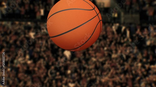 Basketball Game Starting with Tip Off in Slow Motion photo