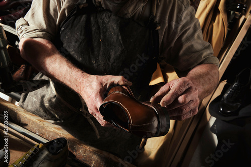 craftsman making luxury handmade man shoes