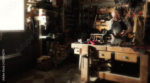 craftsman making luxury handmade man shoes