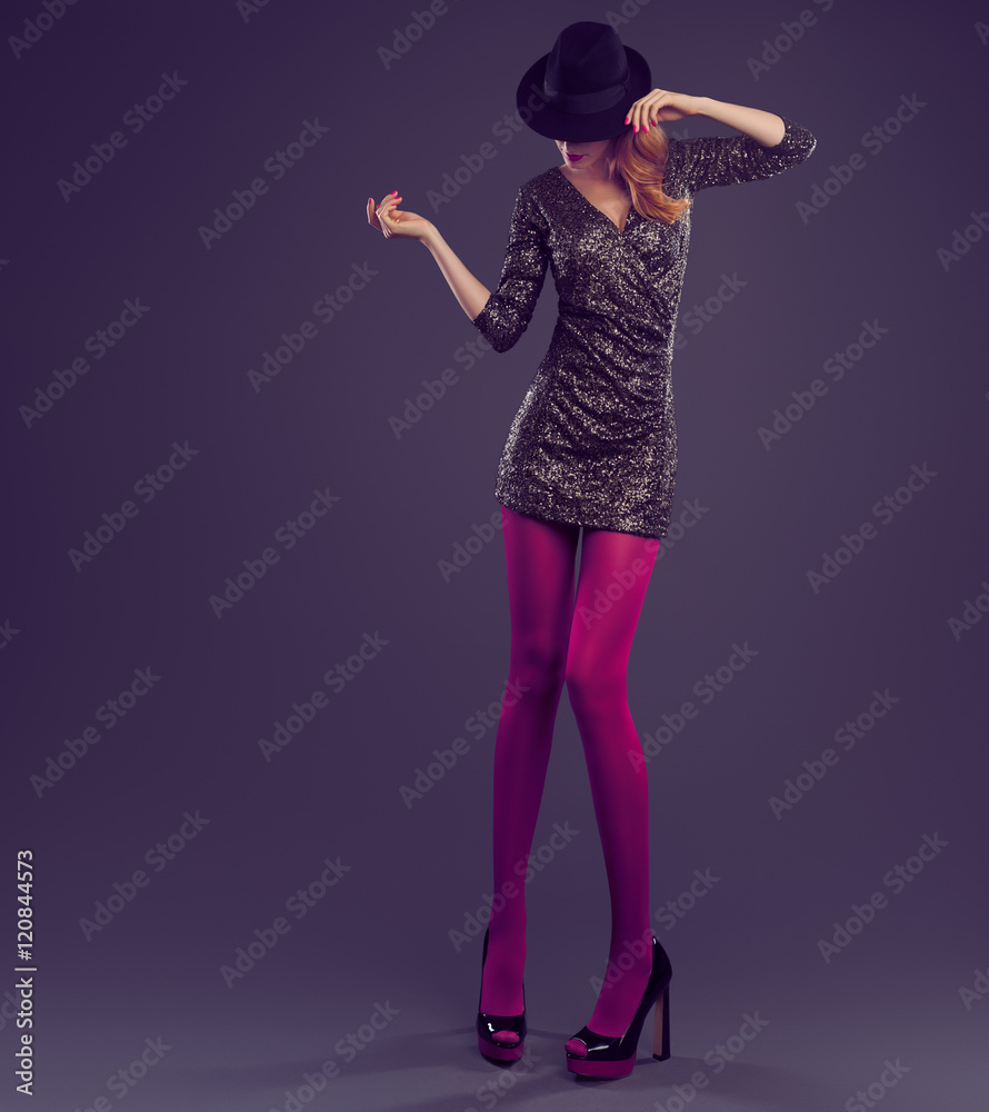 Fashion woman in Glamour Sequin black dress. Stylish Luxury Party lady.  Redhead Sexy Model girl, Fashion Hat, Trendy Glamour fashion Heels,Pantyhose  Long Legs. Fashion Pose. Unusual creative Outfit Stock Photo | Adobe