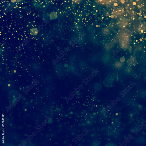 glittering stars on bokeh background