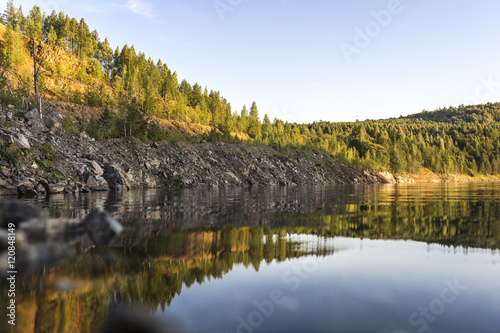 Fototapeta Naklejka Na Ścianę i Meble -  Reflections of the forest in the water