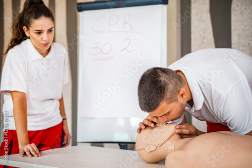 Obraz na płótnie CPR training. Instructors showing CPR technique