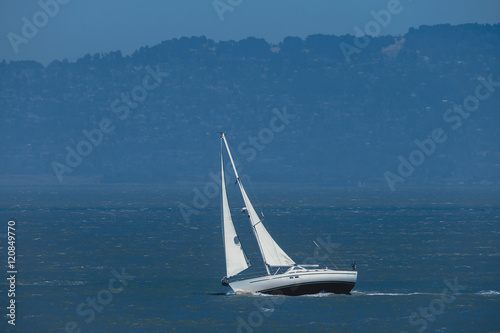 White yacht sails