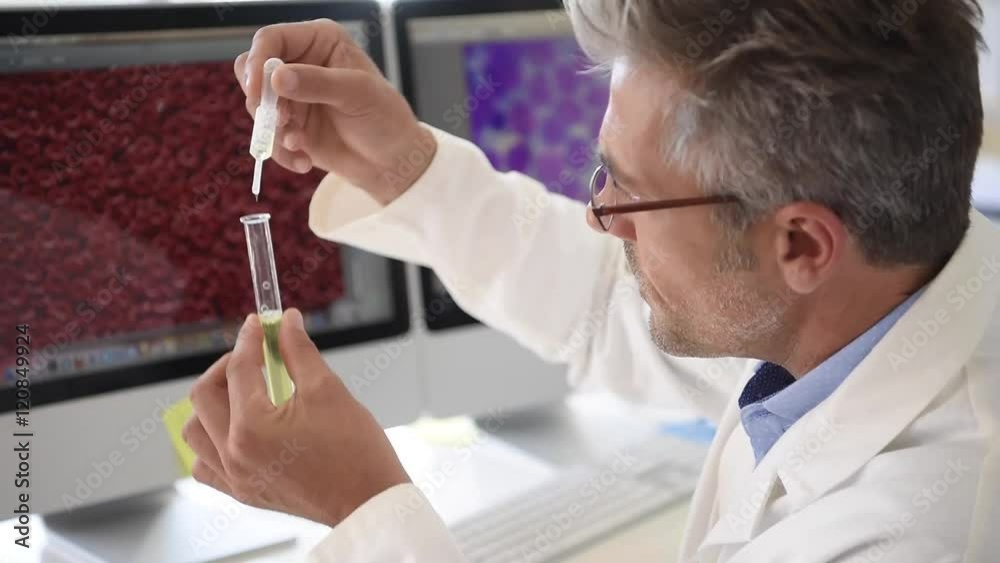 Microbiologist in office working on sample Microbiologist in office working on sample