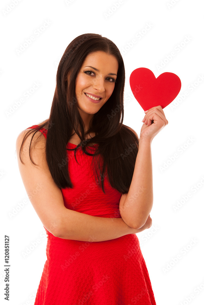 Woman in love wearing red dress holding red heart sending messag Woman in love wearing red dress holding red heart sending messag
