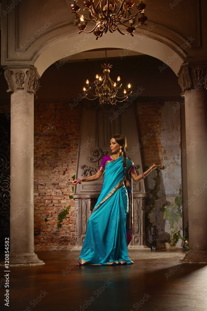 Beautiful young woman in traditional indian clothing