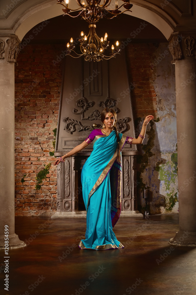 Beautiful young woman in traditional indian clothing