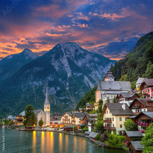 Hallstatt village in Alps and lake at dusk, Austria, Europe photo