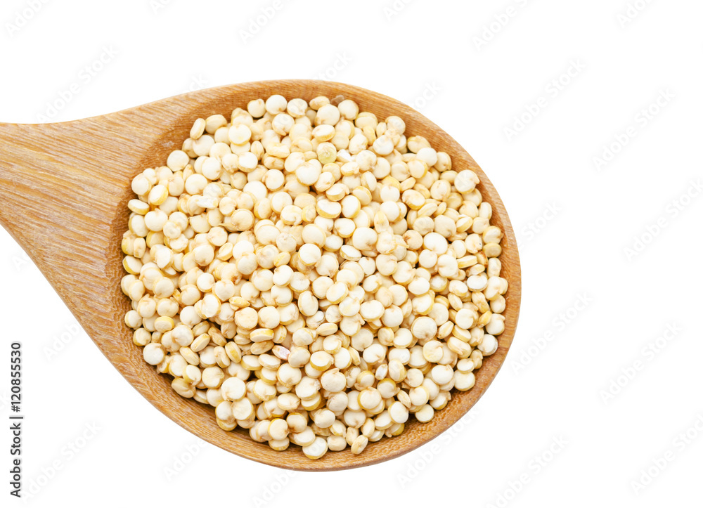 Raw white quinoa seeds in wooden spoon. Raw white quinoa seeds in wooden spoon.