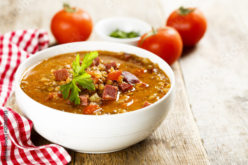 Tomato soup with lentils and sausages
