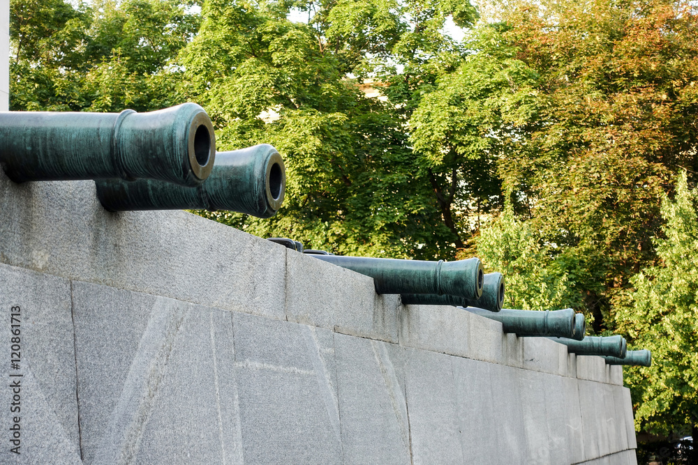 Cannon of the nineteenth century on the wall Cannon of the nineteenth century on the wall