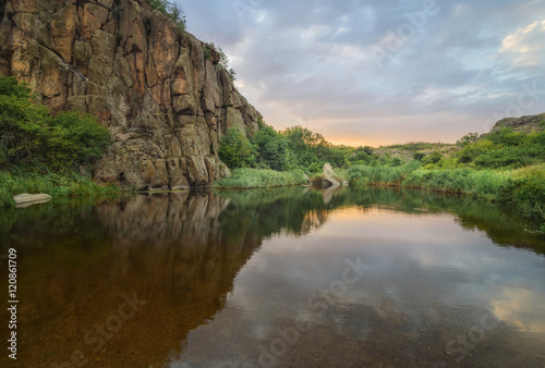 Tranquil lake at sunset