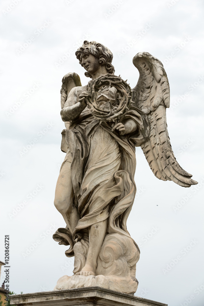 Obraz premium Marble statue of Angel with the Crown of Thorns from the Sant'Angelo Bridge in Rome, Italy, designed by Bernini