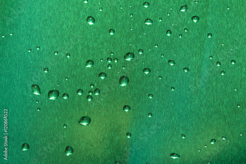 Photos blue brushed metal surface with water drops