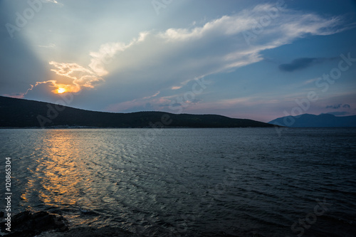 Beautiful Zastani beach at sunset, Evia, Greece photo