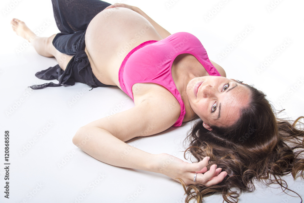 Naklejka premium pregnant woman belly over white background