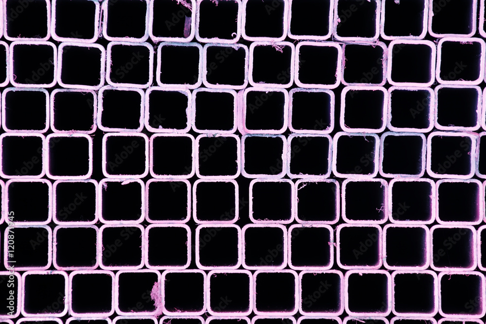 Naklejka premium stack of colorful metal pipe