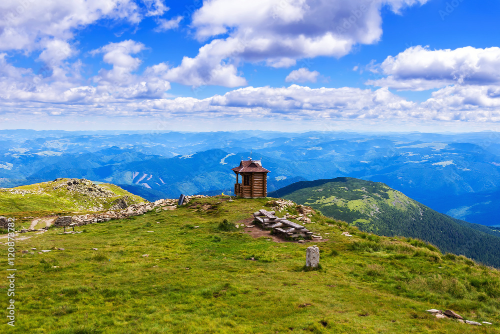 Chapel on the top of Pip Ivan mountain, nature landscape in Carpathians, Ukraine.