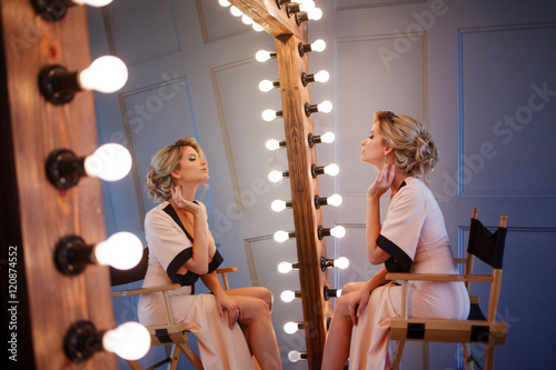 Beauty luxury blonde woman with and mirror, close-up