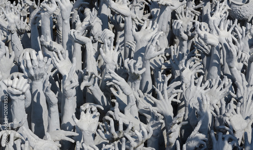 Sculpture. An ocean of hands in Wat Rong Khun, better known to foreigners as the White Temple. Located in Chiang Rai, Thailand.