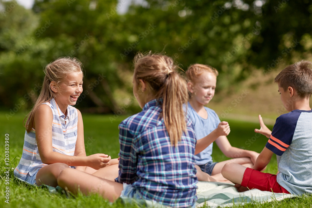 happy kids playing rock-paper-scissors game happy kids playing rock-paper-scissors game