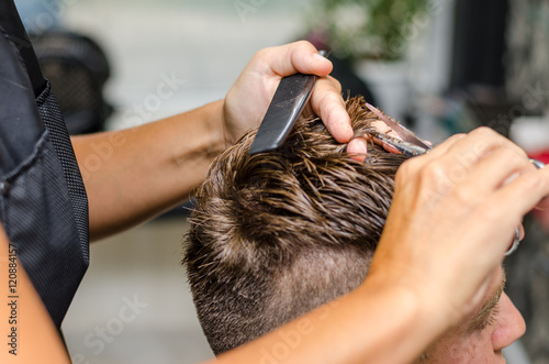 men's hair cutting scissors in a beauty salon © Ivan Dragiev