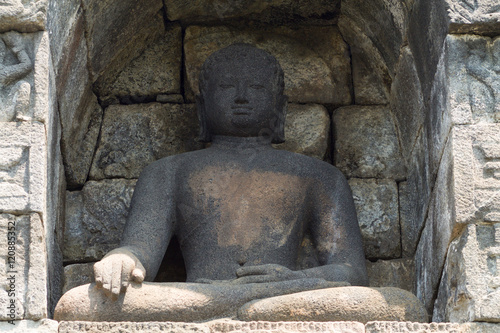 Bhumisparsa Mudra, niche with Buddha in Borobudur temple,Java is photo