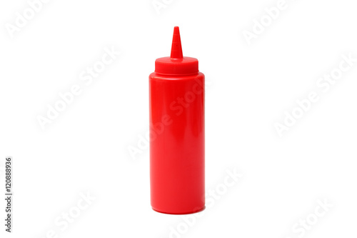 Red ketchup sauce bottle on white background