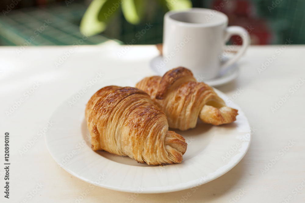 Croissant and coffee, breakfast