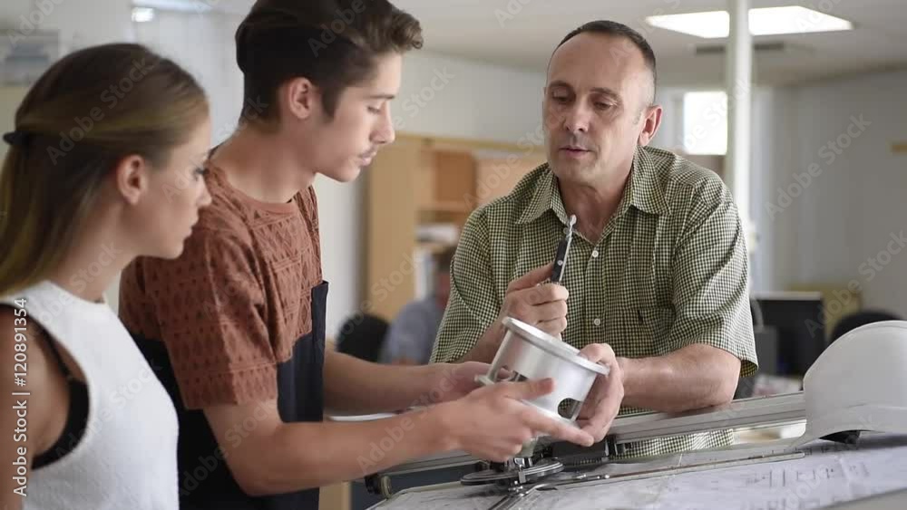 Young people in engineering training class