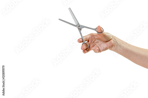 Woman hand is holding thinning scissors